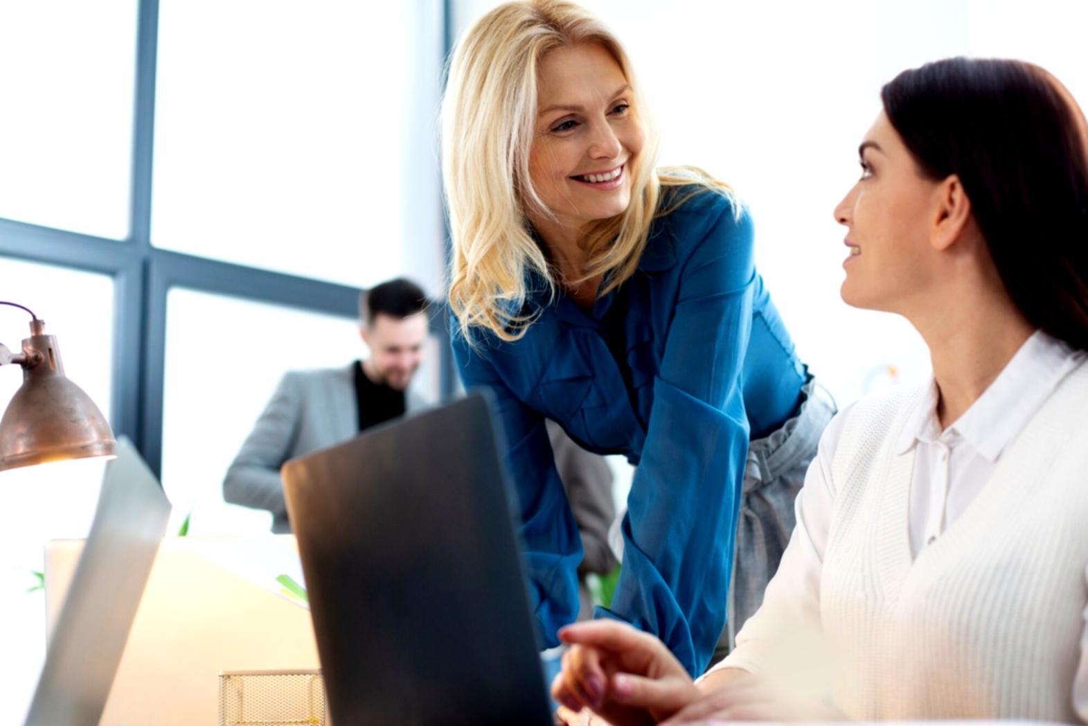 Business professionals reviewing financial charts and growth metrics